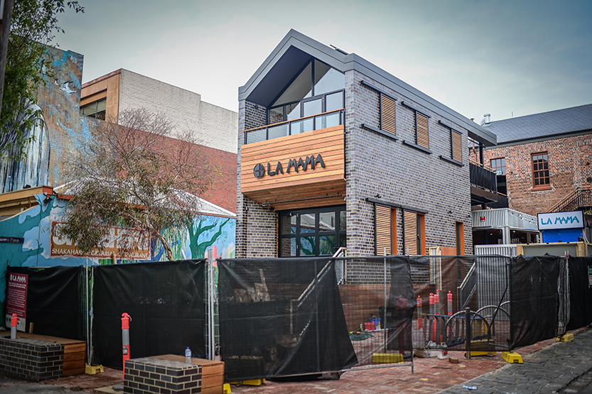Rising from the ashes: La Mama rebuild nearly complete