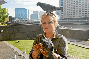 Bird lady does her tricks