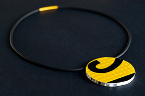 Changing direction: Koorie artist turns road signs into jewellery