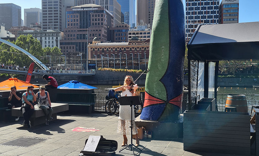 Buskers hit a high a note as live  music scene returns to city streets 