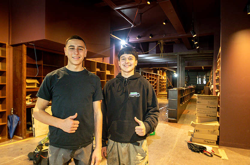 Human chain formed to help Hill of Content move thousands of books to new premises