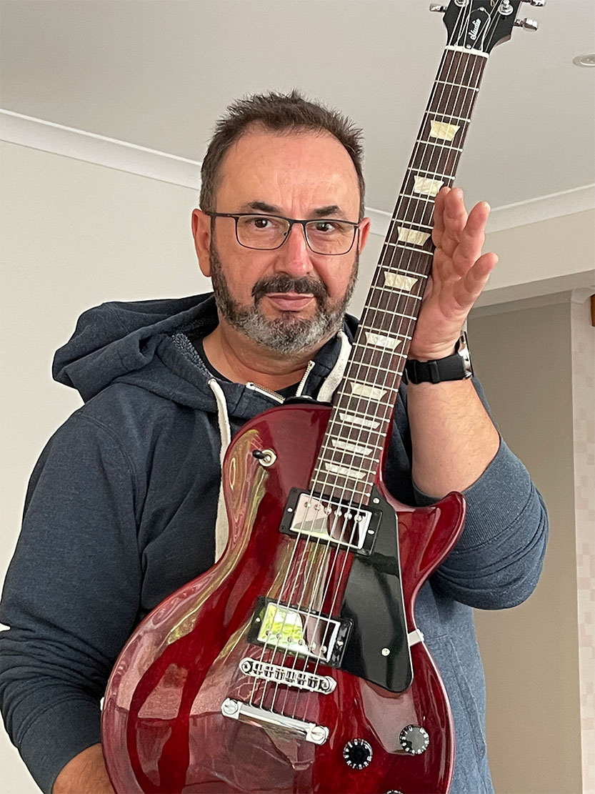 From IT to busking, Billy follows his love of music