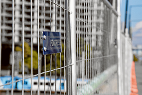Railway protected by fencing