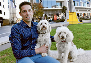 Docklands resident Adrian Sargent initially did not want to own a dog, but eight years ago he fell in love with Maltese cross miniature poodle puppy Snooki.
