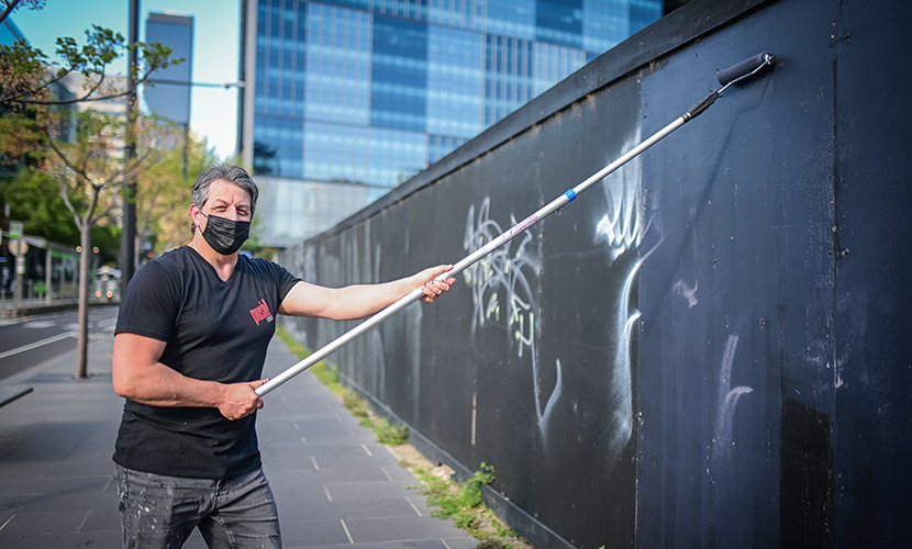One man’s mission to tackle unsightly graffiti in Docklands 