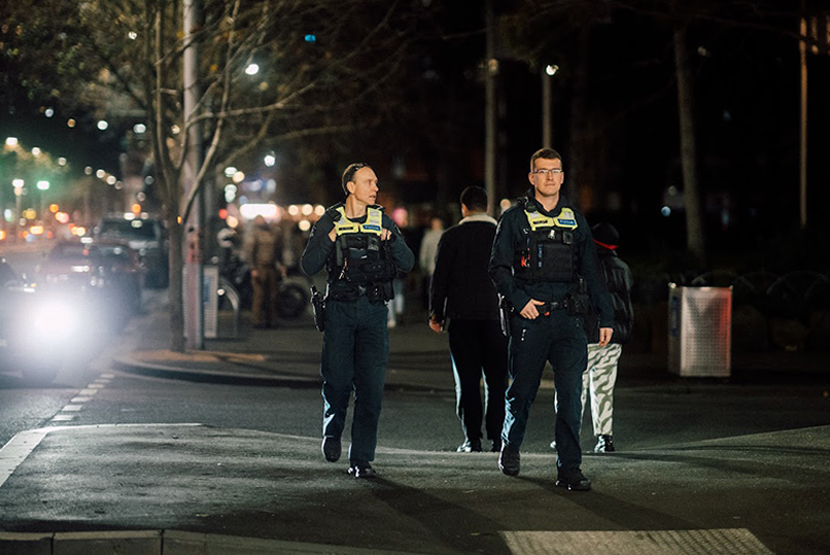 Calls for CCTV security grow after two men allegedly stabbed in Carlton