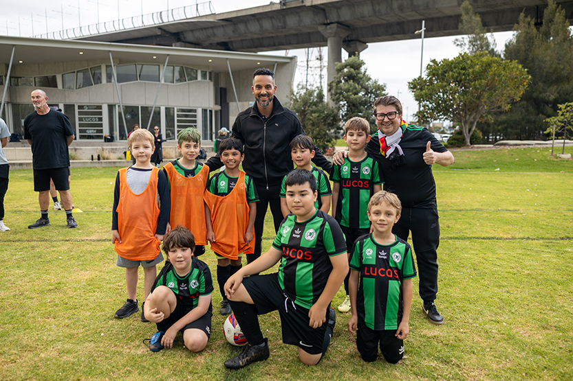 Theo Walcott and Premier League trophy thrill Docklands youngsters