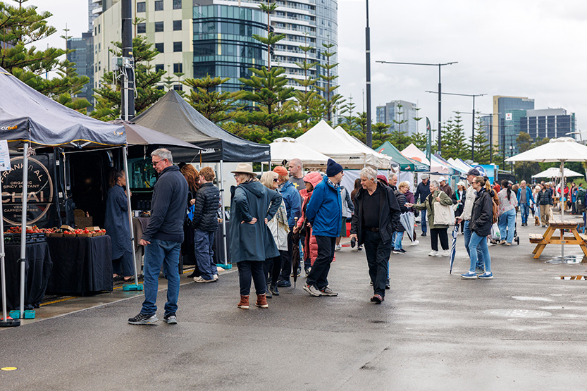 Docklands Waterfront Farmers’ Market launch draws big crowd despite rough weather