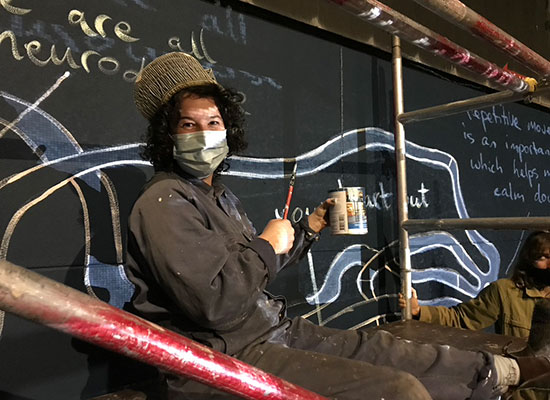 Autistic artist empowers community through mural