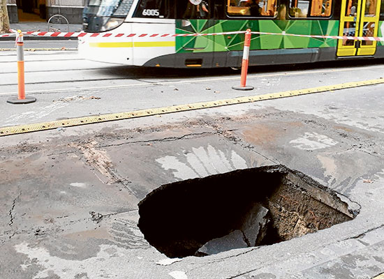 “Hellmouth”: ground opens up on Collins St