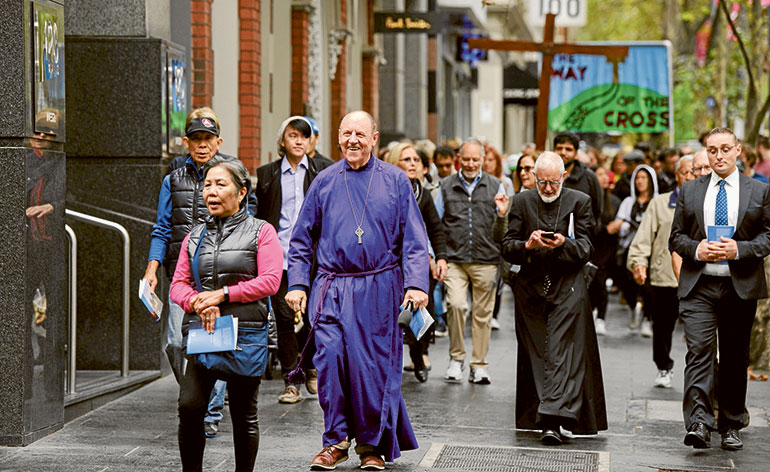 CBD walks the  Way of the Cross