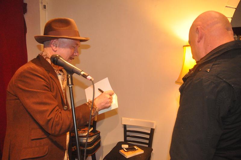 Self-deprecating singer does solo book signing